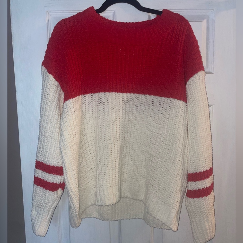 Size large, red and white striped sweater. Brand new, never worn.